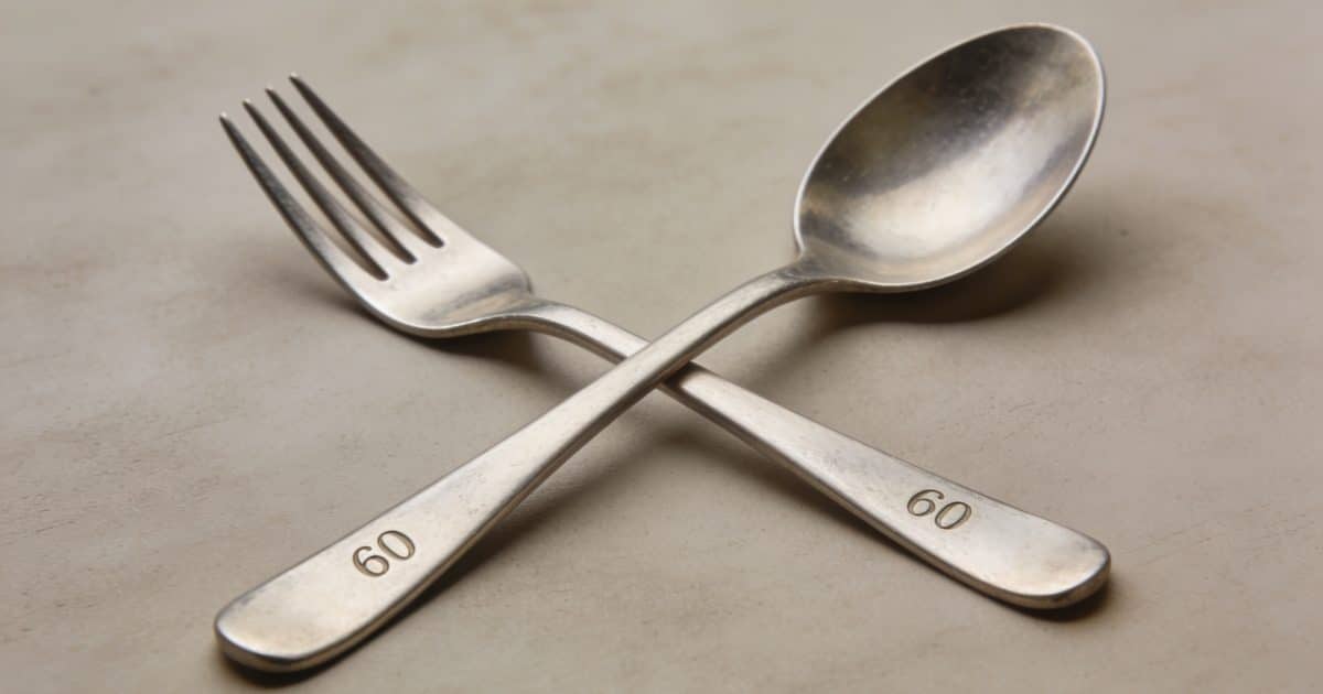 Cuillere et fourchette en argent marquees 60